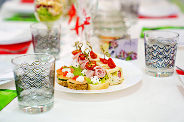 White plate with different canapes arranged for the celebration