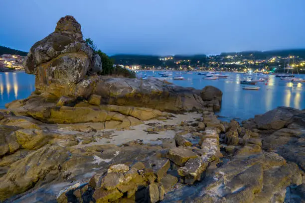 The Aldan Estuary cannot be considered estuary because it is not formed by the mouth of the river, but we can say that it is a deep entree of great beauty of the Pontevedra Estuary in Galicia Spain  . View by dusk.