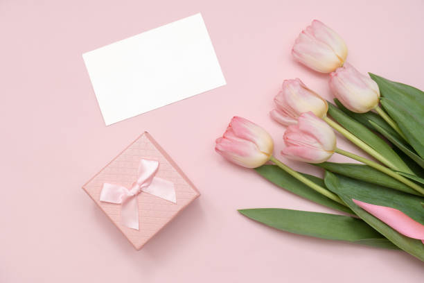 istock Pink tulip bouquet, blank greeting card and gift box 1470464545