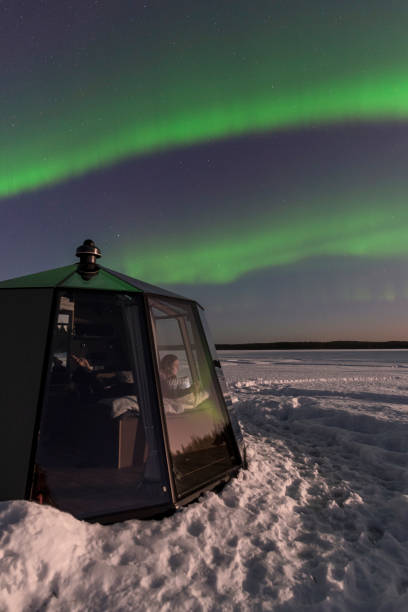 istock Northern lights with glass igloo 1470464658