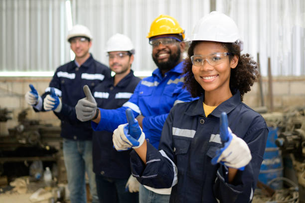 istock Group of confident worker team at factory 1470464721