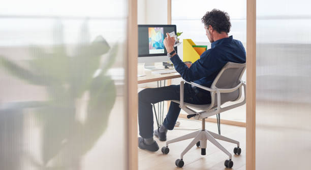 istock Magazine, planning or graphic designer man on computer for creative research, web page strategy or branding. Startup, office or employee at desk working on project for marketing or advertising blog 1470466510