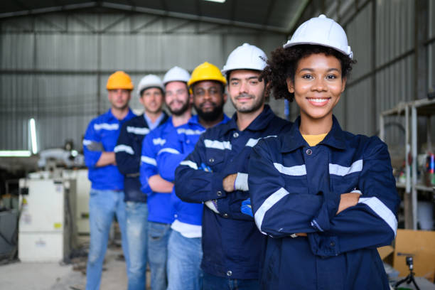 istock Group of confident worker team at factory 1470466668