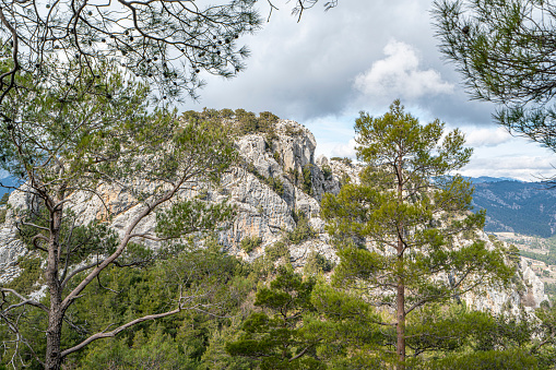 The identification of Mnara with Marmara has generally been accepted at the site of Kavak Daği where it extends over the top and slopes at 1350 m, behind Kemer.