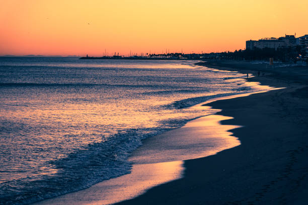 Sunset in Torremolinos beach. Spain stock photo