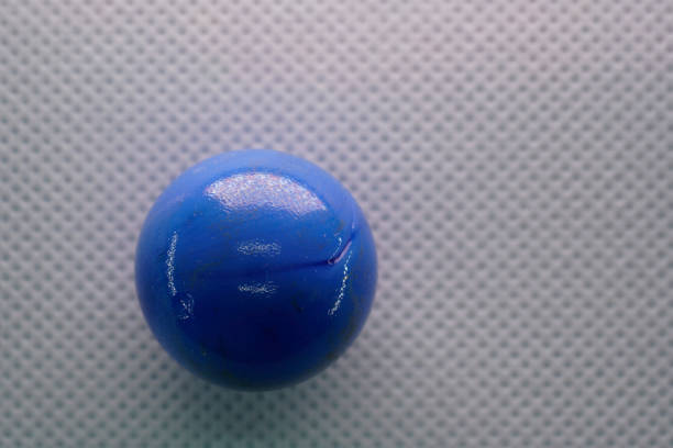 Colorful crystal ball on plain background for fortune telling