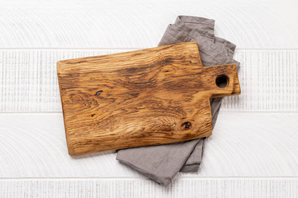 istock Wooden cutting board and kitchen towel 1470469764