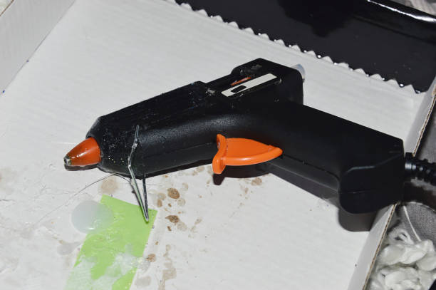 istock glue gun. manual creativity. background for the design. 1470475508