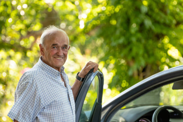 istock older senior man in the car 1470475925