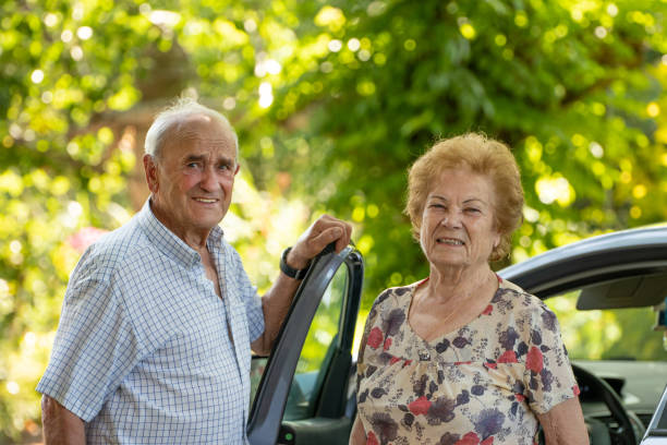 istock senior couple traveling by car 1470475932