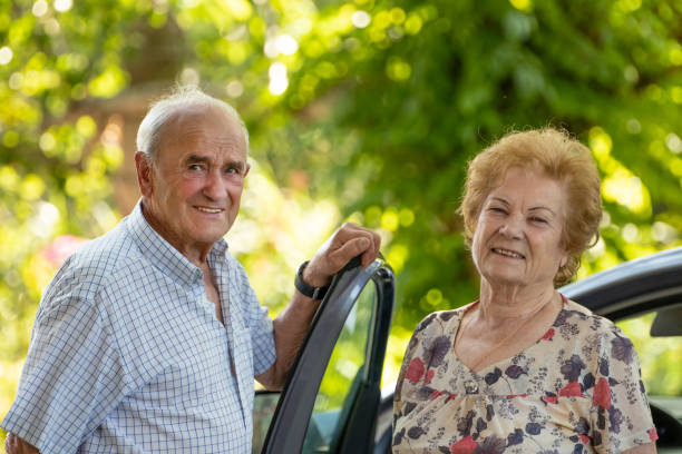 istock senior couple traveling by car 1470475938