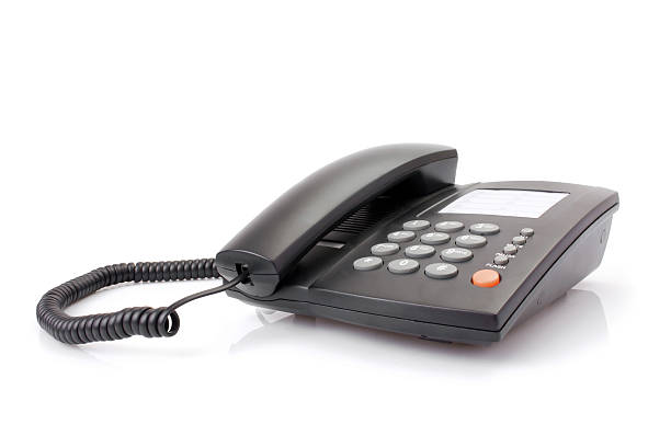 istock Black office telephone isolated on white 147047818
