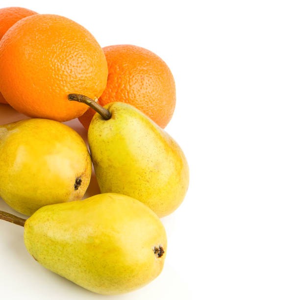 istock Oranges and pears isolated on white. Free space for text. 1470479760