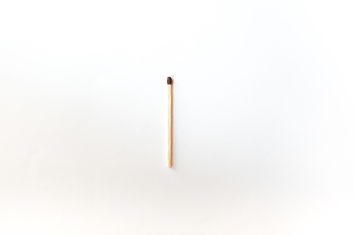 Wooden matches with fire on a black background,