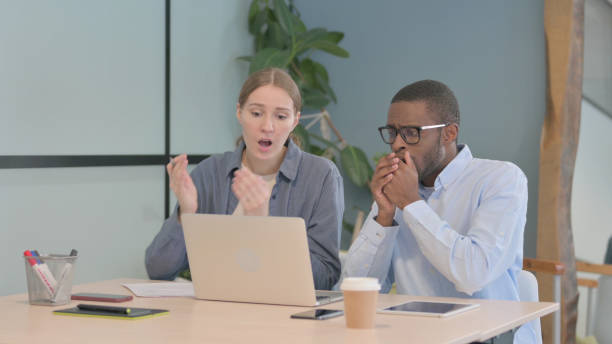 istock Multiethnic Young Business People Reacting to Loss at Work 1470484442