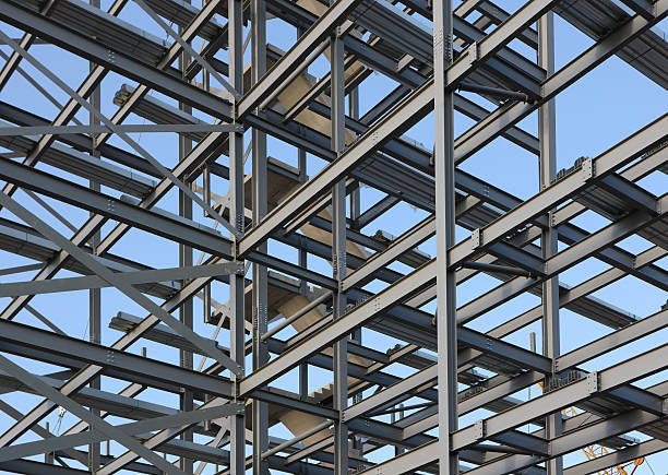 Structural Steel Framework Structural steel framework for a new apartment block under construction. structural steel stock pictures, royalty-free photos & images