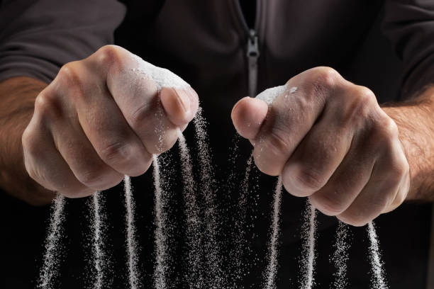 istock sand running through hands as a symbol for time running 1470485757