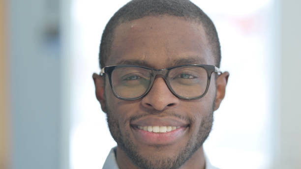 istock Close Up of Smiling African Man Face 1470486286