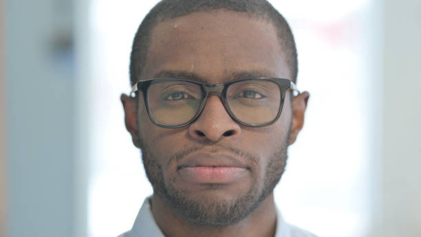 istock Close Up of Serious African Man Face 1470486300