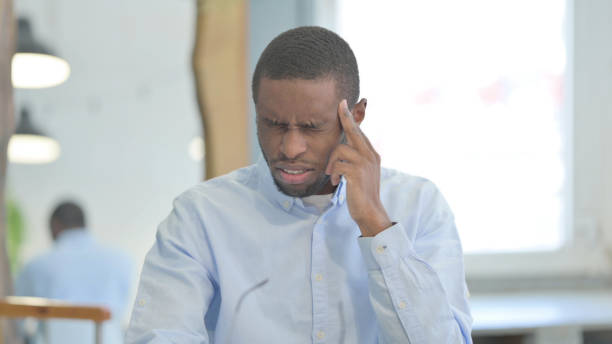 istock Portrait of Tense African Man with Headache 1470486400