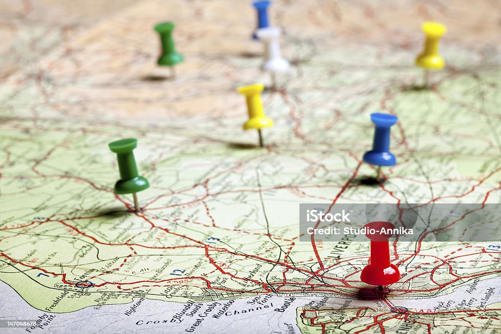 Planning with pushpins Several pushpins on a road-map of a tourist Road Map Stock Photo