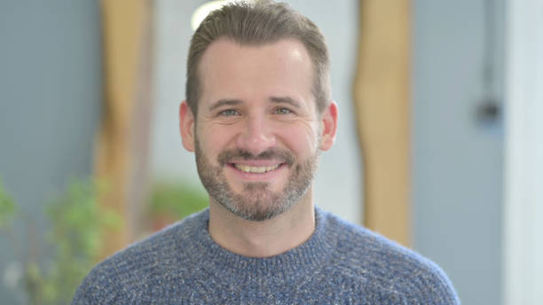 istock Portrait of Smiling Middle Aged Man 1470490137