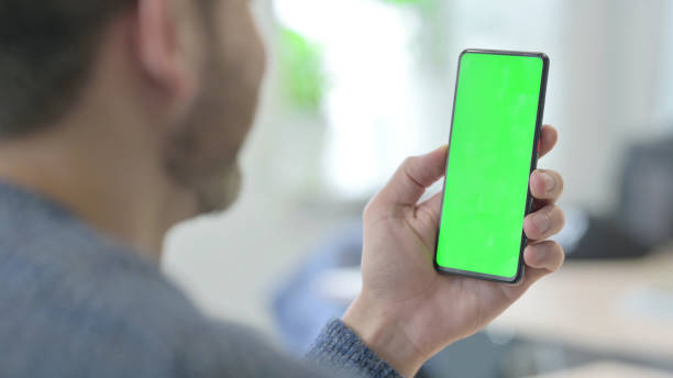 istock Mature Adult Man Using Smartphone Chroma Key Green Screen 1470491859