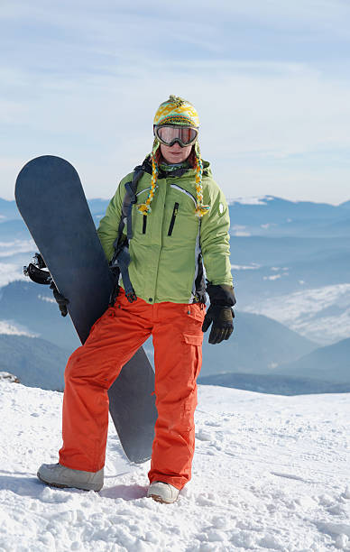 istock Girl with snowboard 147049501