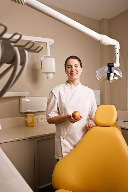 istock Smiling female Dentist 147049542