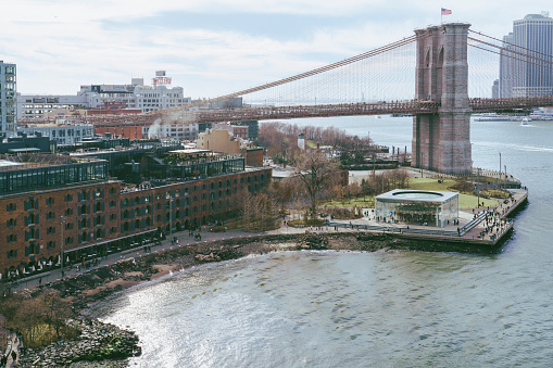 Aerial view of Pebble beach park with Brooklyn bridge in Dumbo New York City USA