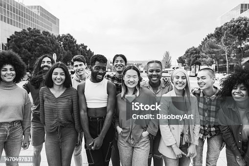 istock Young diverse people having fun outdoor laughing together - Focus on gay man face - Black and white editing 1470497831