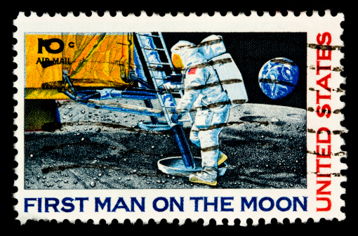 A 1969 issued 10 cent United States Airmail postage stamp showing the first man on the moon.