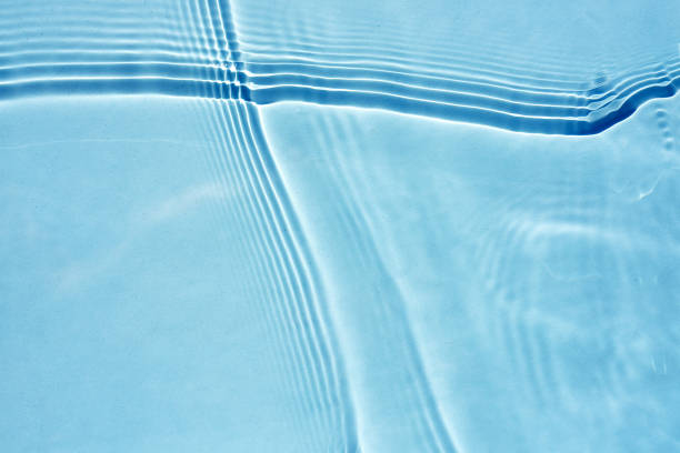 istock Blue water texture, transparent aqua background with wave, ripples, highlights 1470499152