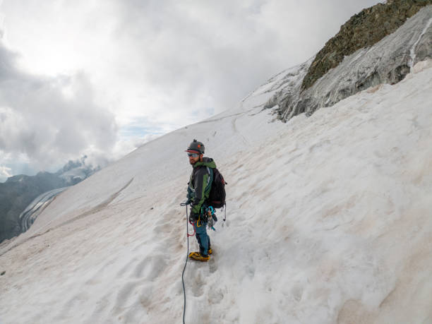 istock Two mountaineer crossing glacier 1470499353