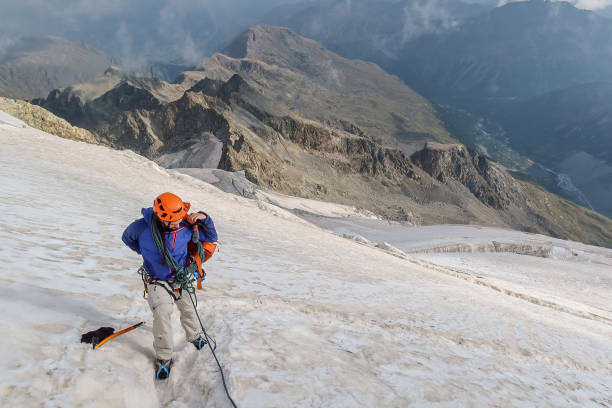 istock Two mountaineer crossing glacier with crevasses 1470499941