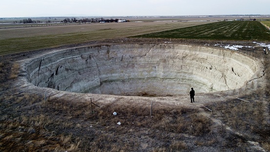 Obruks are large collapse sinkholes in a low limestone plateau within the Konya Basin of central Türkiye. The name of this sinkhole is \