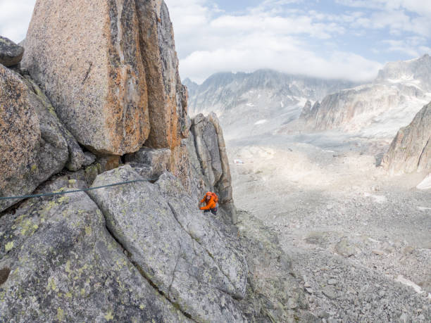 istock Mountain climber on mountain crest in summer 1470501701