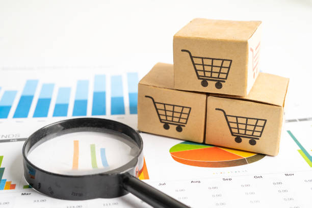 Shopping cart logo on box with magnifying glass on graph background. Banking Account, Investment Analytic research data economy, trading, Business import export transportation online company concept. logotipo del carrito de la compra en la caja con lupa en el fondo del gráfico. cuenta bancaria, economía de datos de investigación analítica de inversión, comercio, concepto de empresa de transporte de exportación de importaciones de negocios en lín