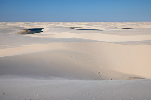 Lençóis Maranhenses National Park. Landscape of dunes and rainwater ponds. Lençóis Maranhenses National Park, Barreirinhas, MA, Brazil. Sandy mountains of Lençóis Maranhenses, Maranhão. tropical scenery.