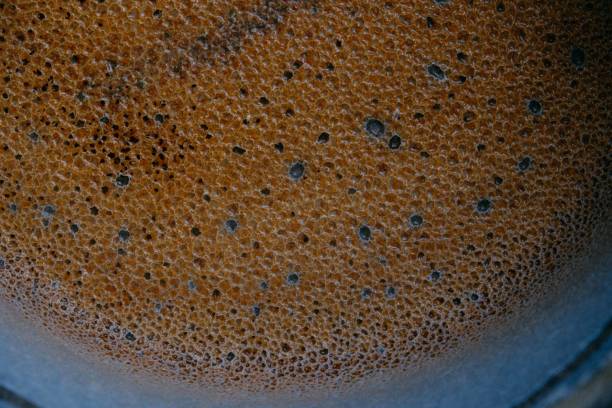istock Empty burnt pot on wooden table background, burnt milk, unclean able stained pot or pan burnt from cooking 1470505182