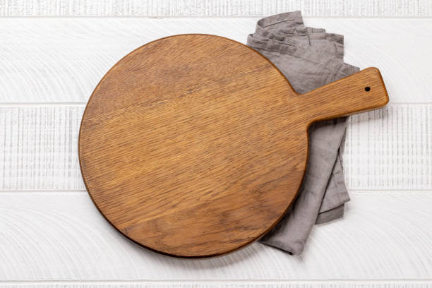 istock Wooden cutting board and kitchen towel 1470507057
