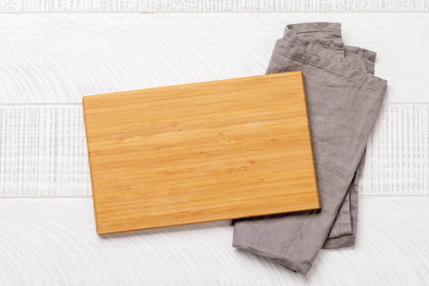 istock Wooden cutting board and kitchen towel 1470507117