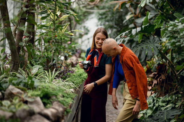 istock Young woman having fun at botanical garden 1470507538