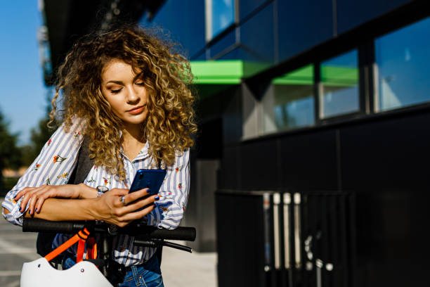 istock Beautiful lady surfing the net on smartphone 1470507695