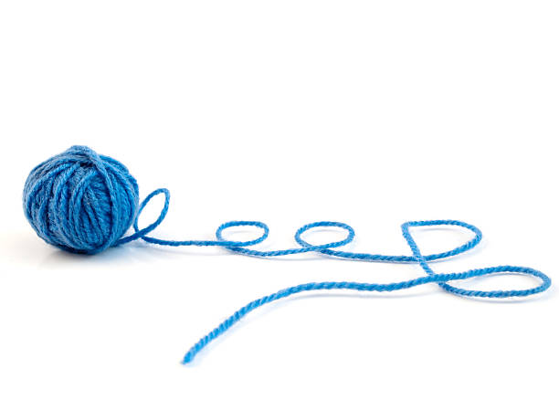 Woman holding woollen yarn balls. Hand made.