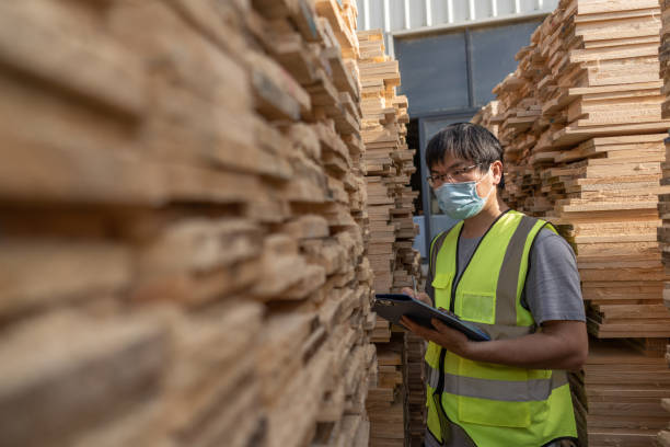istock A male worker is checking the quality of processed wood 1470513441