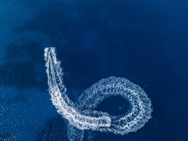 istock Aerial view on jetski in tropical blue waters 1470513590