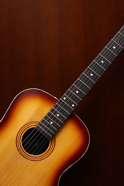istock Acoustic Guitar At Door 147051473