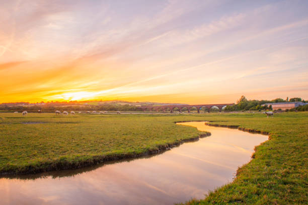 Eleven Arches Viaduct, in Hendy, Swansea, South Wales Sunset over the Eleven Arches Viaduct, in Hendy, Swansea, South Wales swansea stock pictures, royalty-free photos & images