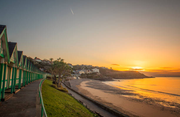 Sunrise at Langland Bay in Swansea, Gower Sunrise at Langland Bay in Swansea, Gower, UK swansea stock pictures, royalty-free photos & images